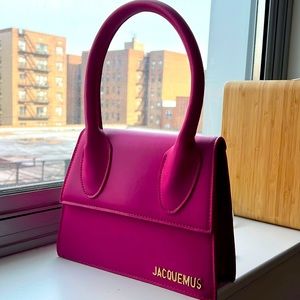 Le Chiquito tote made from pink leather with gold-tone hardware logo lettering